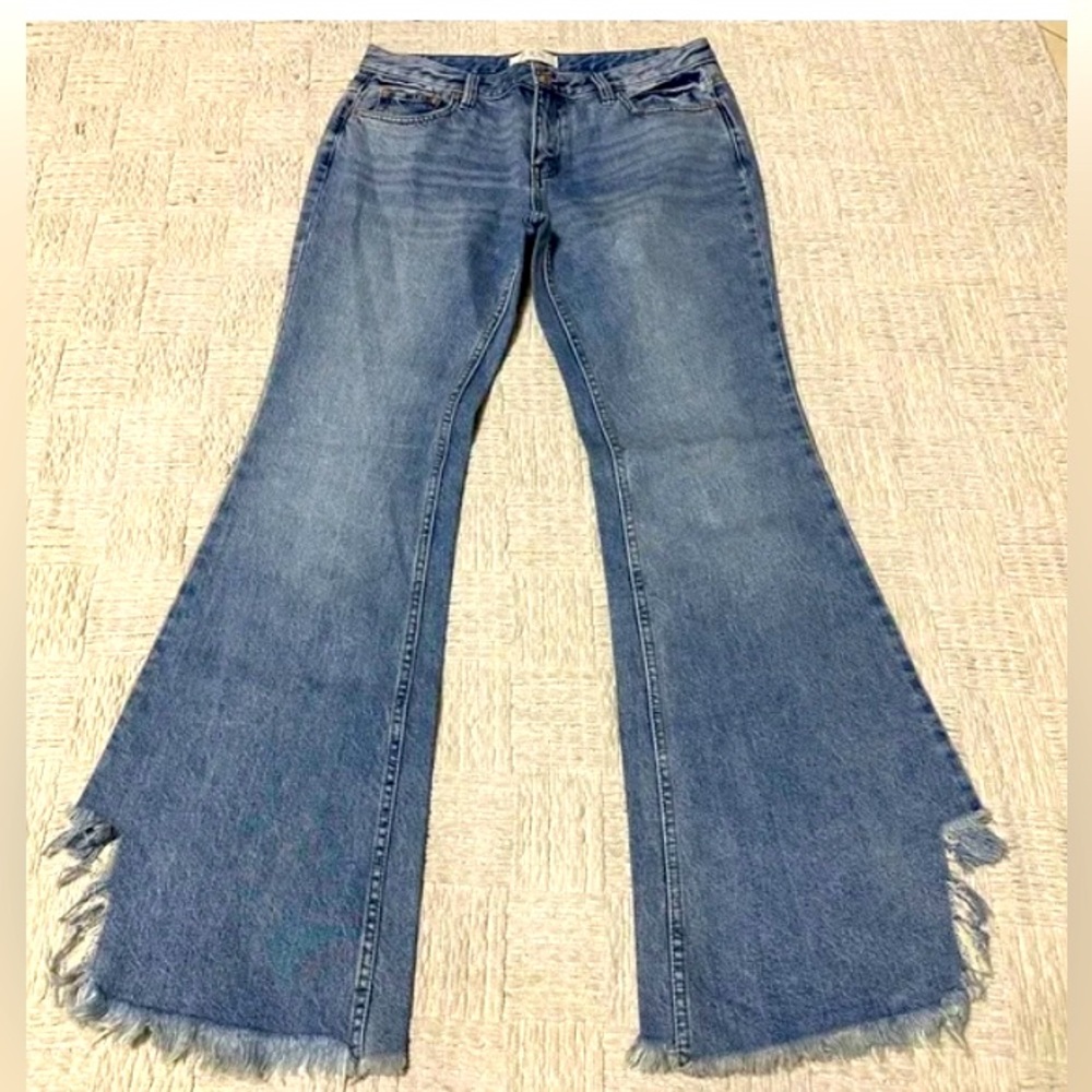 COPY - We The Free Taw Chewed Hem Flared Jeans